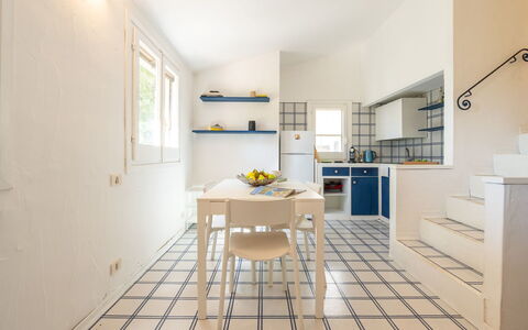 Pellicano: Flooring, Floor, Interior Design, Tile, Ceiling, Kitchen, Chair, Countertop, Design