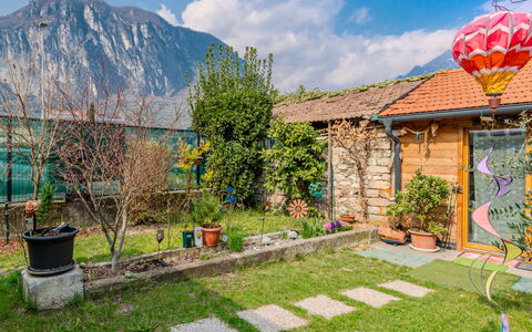 Arcobaleno House Gardalake: Mountain Range, Garden, Spring, Valley, Yard, Alps, Lawn, Landscaping, Shade, Eco Hotel