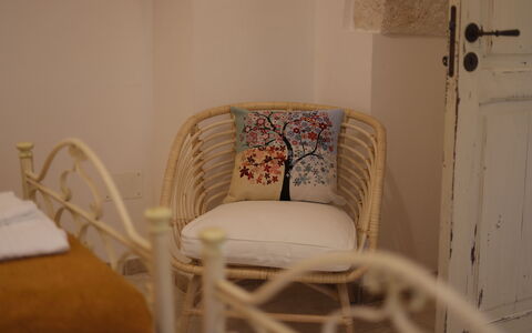 Trulli Retreat, Pool, Locorotondo: Furniture, Interior Design, Wood, Chair, Room, Floor, Comfort, Living Room, Wood Stain, Throw Pillow