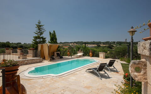 Trulli Retreat, Pool, Locorotondo: Swimming Pool, Composite Material, Outdoor Furniture, Flagstone, Shade, Resort, Chair, Estate, Hacienda, Water Feature