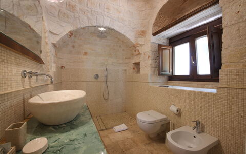 Trulli Retreat, Pool, Locorotondo: Wall, Plumbing Fixture, Flooring, Interior Design, Floor, Bathroom, Sink, Lighting, Tap, Tile