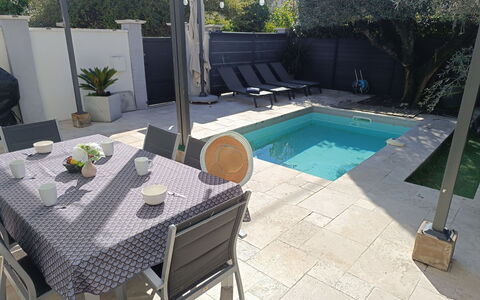 Villa Clem: Furniture, Outdoor Furniture, Chair, Swimming Pool, Floor, Flooring, Table, Shade, Composite Material, Outdoor Table