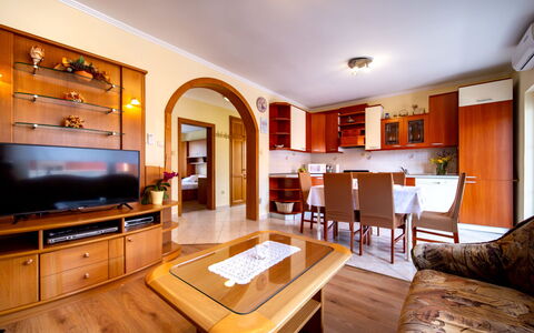Rab Lopar 110: Interior Design, Furniture, Flooring, Wood, Floor, Ceiling, Television, Room, Living Room, Lighting