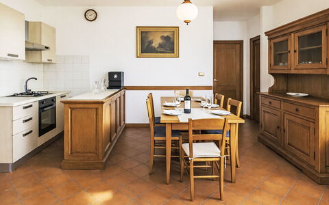 Casa Laura: Interior Design, Furniture, Flooring, Wood, Cabinetry, Ceiling, Floor, Countertop, Room, Kitchen