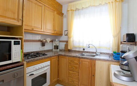 Calpe Calp 971: Cabinetry, Property, Room, Furniture, Kitchen, Countertop, Interior Design, Building, Yellow, Major Appliance