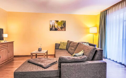 Thale 700: Furniture, Interior Design, Couch, Flooring, Floor, Room, Living Room, Lighting, Apartment