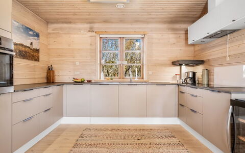 Uolevi - 1.1Km from the Sea: Wood, Flooring, Kitchen, Wood Flooring, Floor, Countertop, Interior Design, Cabinetry, Home, Ceiling