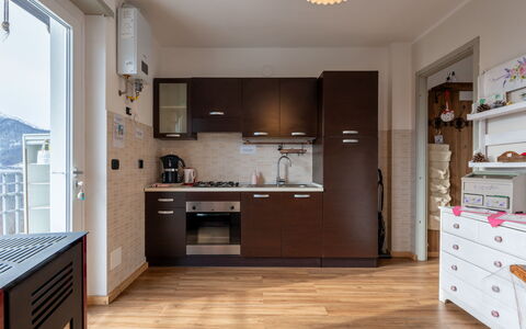 Trekker'S Home L'Infinito: Furniture, Interior Design, Flooring, Wood, Kitchen, Cabinetry, Major Appliance, Kitchen Appliance, Floor, Room