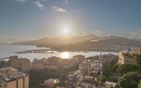 Sea Escape: Mountainous Landforms, Horizon, City, Hill, Landscape, Mountain, Residential Area, Dusk, Human Settlement, Coastal And Oceanic Landforms