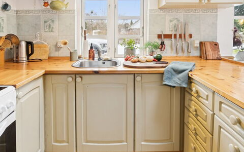 Holmfridur - 1.1Km from the Sea: Kitchen, Kitchen Appliance, Countertop, Cabinetry, Interior Design, Furniture, Wood, Flooring, Major Appliance, Kitchen Sink
