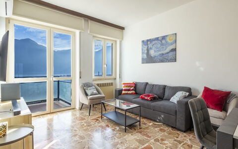 Lovere Balcony View: Flooring, Interior Design, Furniture, Floor, Couch, Room, Ceiling, Living Room, Apartment