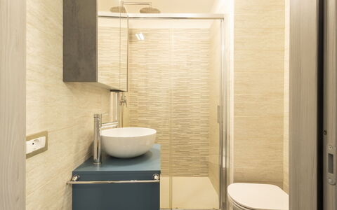 Cacciatori: Bathroom, Flooring, Plumbing Fixture, Interior Design, Wall, Floor, Bathroom Sink, Sink, Mirror, Wood
