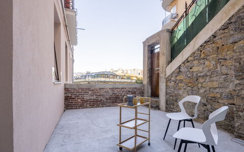 La Casa di Bruno, Terrace, in the Heart of Genova: Composite Material, Apartment, Chair, Balcony, Concrete, Wood Stain, Handrail, Hardwood, Stairs, Wood Flooring