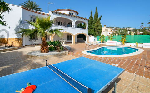 Luisa: Sky, Property, Plant, Building, Azure, Tree, Water, Outdoor Furniture, Shade, Arecales