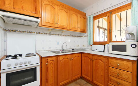 La Vina: Countertop, Cabinetry, Property, Kitchen, Room, Furniture, Interior Design, Building, Floor, Orange