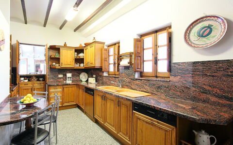Baile del Sol: Countertop, Property, Room, Furniture, Kitchen, Cabinetry, Building, Interior Design, Yellow, Real Estate
