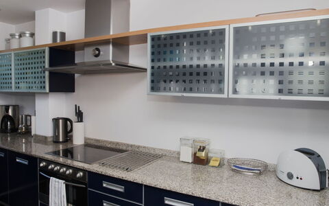 Brisa al Mar: Countertop, Cabinetry, Room, Property, Kitchen, Furniture, Interior Design, Tile, Cupboard, Building