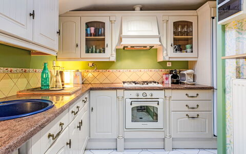 Girofla: Kitchen, Kitchen Appliance, Countertop, Cabinetry, Interior Design, Major Appliance, Flooring, Wood, Furniture, Floor