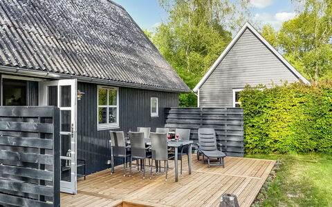 Tomassine: Roof, Cottage, Home, Siding, Garden, Shade, Garden Buildings, Backyard, Lawn, Yard