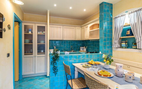 Suite la Torre: Interior Design, Flooring, Furniture, Floor, Ceiling, Countertop, Kitchen, Room, Lighting, Tile