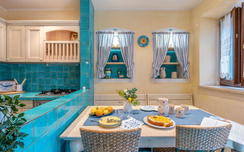 Suite la Torre: Furniture, Interior Design, Flooring, Kitchen, Room, Ceiling, Floor, Table, Lighting, Countertop