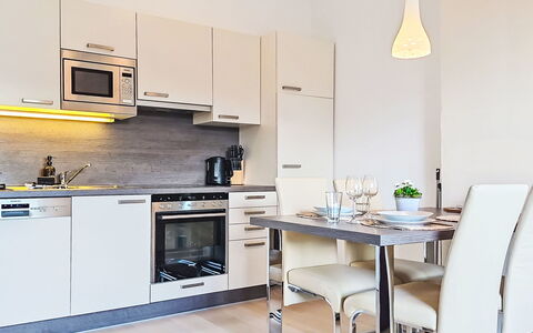 Flachau 800: Furniture, Interior Design, Flooring, Kitchen Appliance, Countertop, Kitchen, Wood, Major Appliance, Floor, Cabinetry