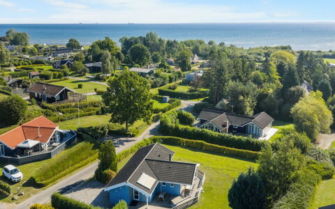 Sybil - 350M from the Sea: Roof, Home, Door, Cottage, Shade, Siding, Yard, Estate, Backyard