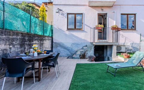 Blue Home: Furniture, Floor, Flowerpot, Garden, Outdoor Furniture, Houseplant, Courtyard, Chair, Backyard, Yard