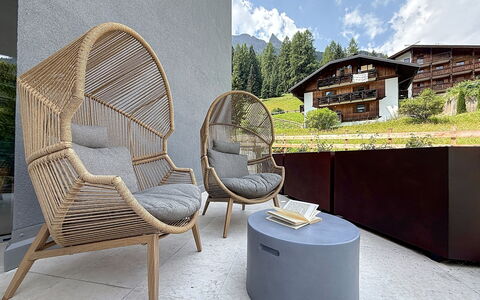 Domus Canazei: Furniture, Chair, Outdoor Furniture, Wicker, Natural Material, Living Room, Design, Armrest, Houseplant, Couch