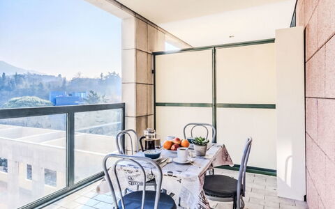 Casa Martinetta: Furniture, Floor, Chair, Apartment, Glass, Shade, Coffee Table, Kitchen & Dining Room Table, Balcony, Daylighting