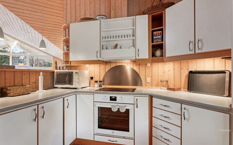 Hollie - 75M from the Sea: Kitchen, Countertop, Kitchen Appliance, Interior Design, Cabinetry, Wood, Flooring, Furniture, Ceiling, Major Appliance
