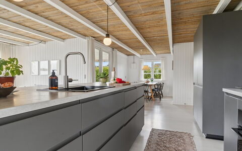 Bjarni - 180M from the Sea: Kitchen, Countertop, Cabinetry, Ceiling, Kitchen Appliance, Hardwood, Wood Flooring, Major Appliance, Plank, Houseplant