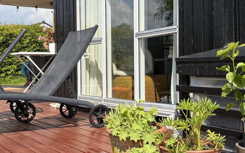Bjarni - 180M from the Sea: Furniture, Flowerpot, Outdoor Furniture, Hardwood, Houseplant, Garden, Chair, Deck, Yard, Wood Flooring
