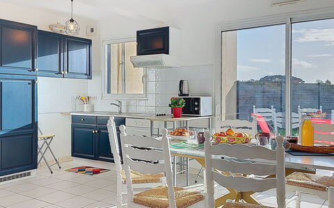 An Ty Porzh: Furniture, Interior Design, Chair, Flooring, Kitchen, Table, Floor, Kitchen Appliance, Ceiling, Kitchen & Dining Room Table