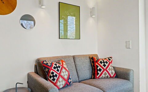 Apartment am See: Furniture, Interior Design, Couch, Wall, Flooring, Floor, Living Room, Room, Wood, Home