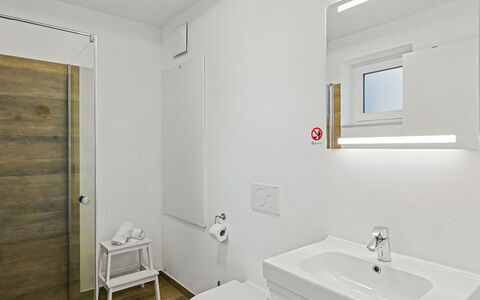 Apartment am See: Flooring, Floor, Wall, Wood, Interior Design, Ceiling, Plumbing Fixture, Bathroom, Plumbing, Toilet