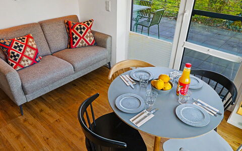 Apartment am See: Furniture, Interior Design, Home, Apartment, Chair, Wood Stain, Living Room, Houseplant, Couch