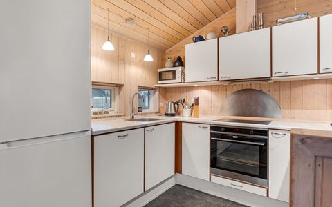 Garth - 50M from the Sea: Kitchen, Wood, Kitchen Appliance, Countertop, Major Appliance, Interior Design, Ceiling, Flooring, Cabinetry, Floor