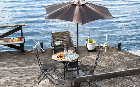 Skärgårdsdröm På Ön: Furniture, Outdoor Furniture, Umbrella, Chair, Table, Outdoor Table, Coastal And Oceanic Landforms, Coast, Sea, Deck