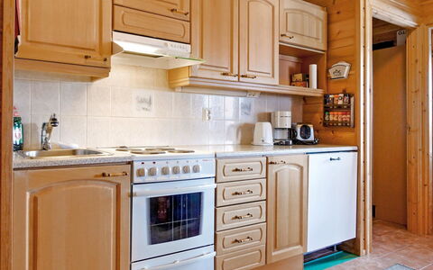 Luongasloma 3: Kitchen, Kitchen Appliance, Cabinetry, Major Appliance, Countertop, Wood, Flooring, Interior Design, Cupboard, Floor