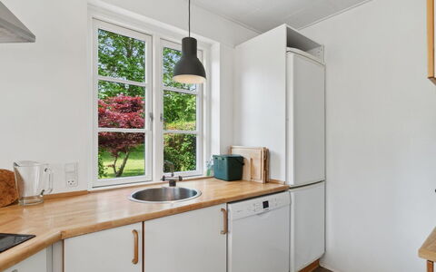 Siegfried - 100M from the Sea: Interior Design, Kitchen, Flooring, Countertop, Wood, Kitchen Appliance, Floor, Plumbing Fixture, Kitchen Sink, Cabinetry