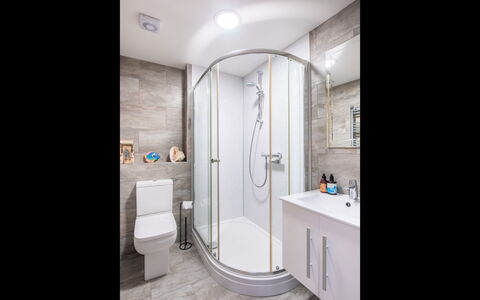 Marina View: Bathroom, Plumbing Fixture, Sink, Interior Design, Flooring, Floor, Tap, Plumbing, Toilet, Bathroom Cabinet