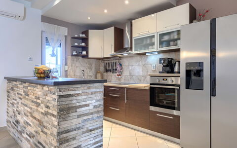 L&V: Furniture, Countertop, Flooring, Interior Design, Kitchen, Wood, Cabinetry, Floor, Home, Kitchen Appliance