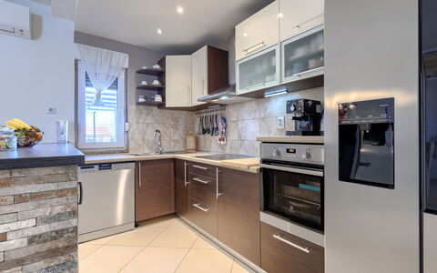 L&V: Kitchen Appliance, Kitchen, Countertop, Furniture, Cabinetry, Major Appliance, Interior Design, Flooring, Wood, Floor