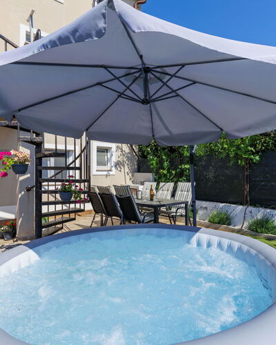 L&V: Swimming Pool, Outdoor Furniture, Umbrella, Composite Material, Furniture, Leisure, Shade, Flowerpot, Chair, Houseplant