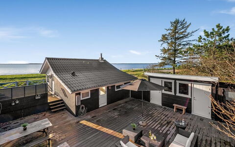 Esben - 15M from the Sea: Roof, House, Home, Cottage, Door, Siding, Estate, Lawn, Yard, Porch