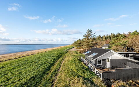 Esben - 15M from the Sea: Roof, House, Home, Cottage, Door, Siding, Estate, Lawn, Yard, Porch