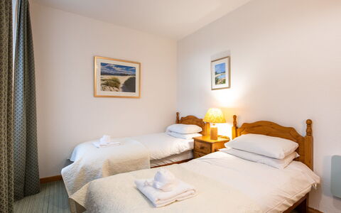 Old Stable on Aigas Golf Course: Wood, Bedroom, Bed, Furniture, Bed Sheet, Bedding, Bed Frame, Linens, Pillow, Nightstand