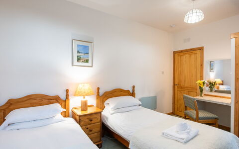 Old Stable on Aigas Golf Course: Furniture, Bed, Bedroom, Wood, Bed Sheet, Bedding, Interior Design, Floor, Bed Frame, Flooring
