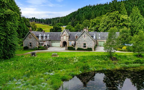 Pond View on Aigas Golf Course: Shrub, House, Estate, Cottage, Home, Rural Area, Mansion, Farmhouse, Garden, Landscaping